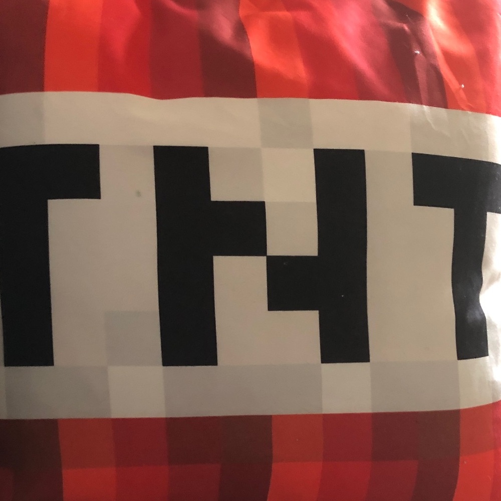 Red Pixel Stripe Pillow with Bold Black Geometric Print